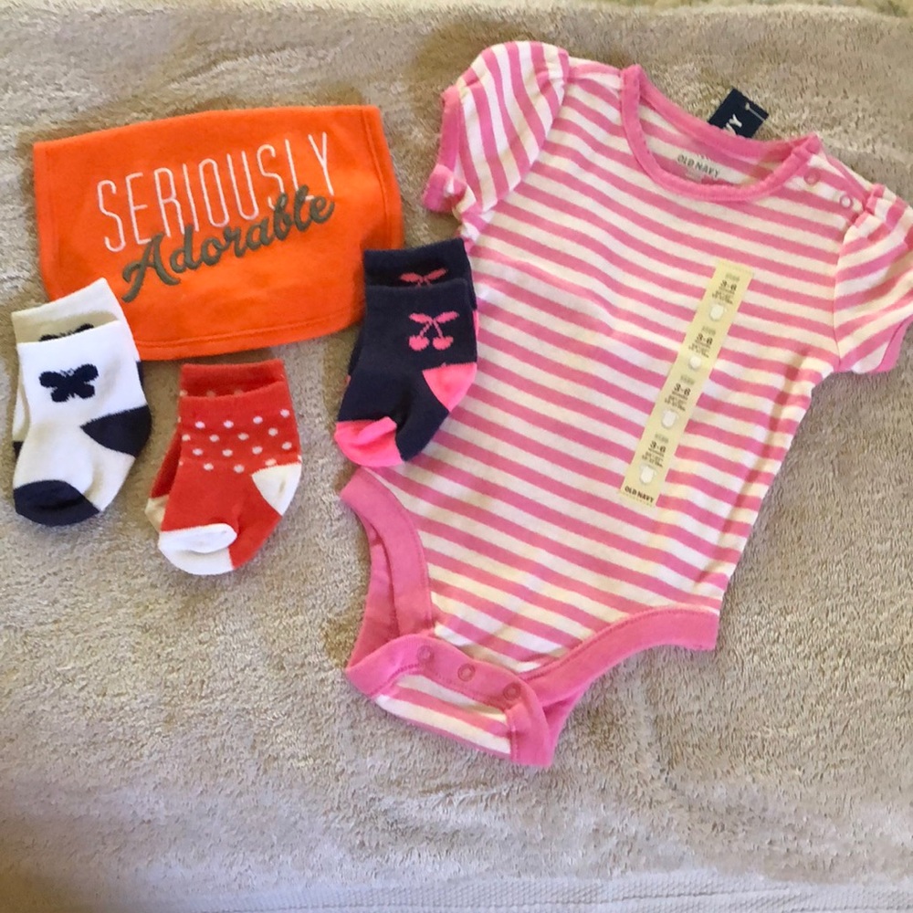 Old Navy Onesie, Bibb, and three pairs of unworn socks